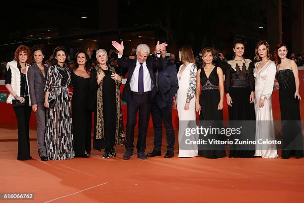 Cast members of the movie walk a red carpet for '7 Minuti' during the 11th Rome Film Festival at Auditorium Parco Della Musica on October 21, 2016 in...