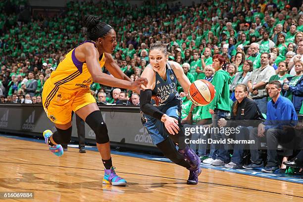 Lindsay Whalen of the Minnesota Lynx drives to the basket against Nneka Ogwumike of the Los Angeles Sparks during Game Five of the 2016 WNBA Finals...