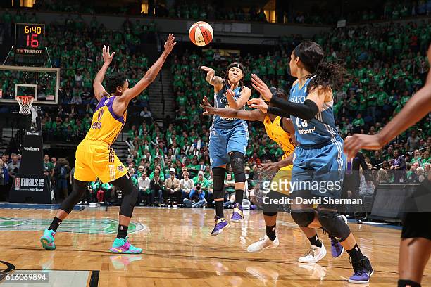 Seimone Augustus passses the ball to Maya Moore of the Minnesota Lynx against the Los Angeles Sparks during Game Five of the 2016 WNBA Finals on...