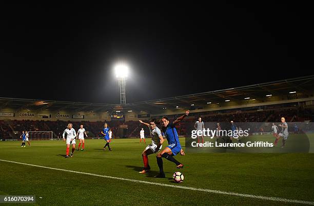 Amel Majri of France battles with Karen Carney of England during the International Friendly between England and France at Keepmoat Stadium on October...