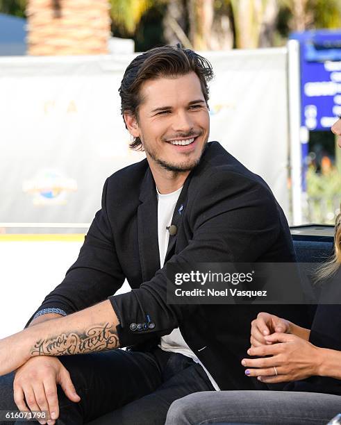 Gleb Savchenko visit "Extra" at Universal Studios Hollywood on October 21, 2016 in Universal City, California.