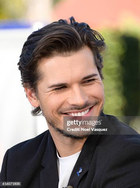 Gleb Savchenko visit "Extra" at Universal Studios Hollywood on October 21, 2016 in Universal City, California.