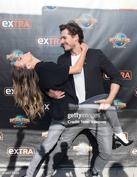 Jana Kramer and Gleb Savchenko visit "Extra" at Universal Studios Hollywood on October 21, 2016 in Universal City, California.