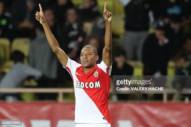Monaco's French forward Kylian Mbappe Lottin celebrates after scoring a goal during the French L1 football match between AS Monaco and Montpellier at...