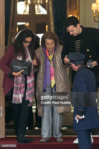 Francoise Bettencourt Meyers, Liliane Bettencourt and Jean-Victor Meyers leave the RITZ hotel on October 21, 2016 in Paris, France.