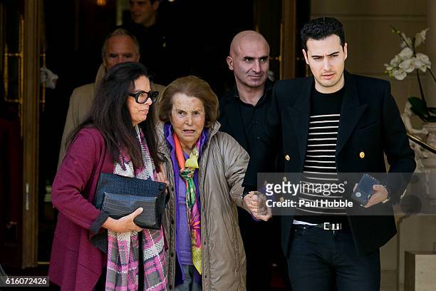 Francoise Bettencourt Meyers, Liliane Bettencourt and Jean-Victor Meyers leave the RITZ hotel on October 21, 2016 in Paris, France.
