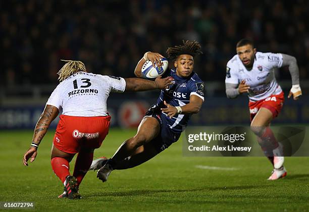 Paolo Odogwu of Sale Sharks runs at Mathieu Bastareaud of RC Toulon during the European Rugby Champions Cup match between Sale Sharks and RC Toulonon...