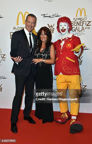 Henry Maske, Manuela Maske and Ronald McDonald during the McDonald's charity gala at Hotel Bayerischer Hof on October 21, 2016 in Munich, Germany.
