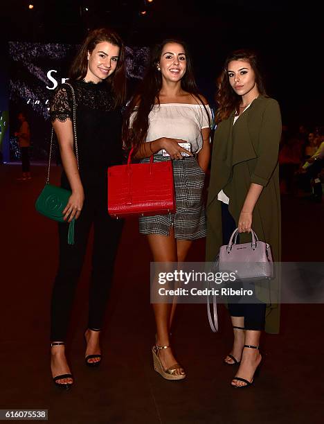 Guests attend the Ezra show during Fashion Forward Spring/Summer 2017 at the Dubai Design District on October 21, 2016 in Dubai, United Arab Emirates.