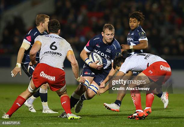 Jonathon Mills of Sale Sharks runs at the RC Toulon defence during the European Rugby Champions Cup match between Sale Sharks and RC Toulonon at AJ...