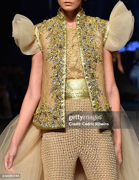 Model, detail, walks the runway at the Ezra show during Fashion Forward Spring/Summer 2017 at the Dubai Design District on October 21, 2016 in Dubai,...