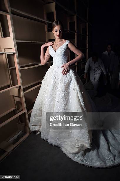 Model backstage ahead of the Ezra show during Fashion Forward Spring/Summer 2017 at the Dubai Design District on October 21, 2016 in Dubai, United...