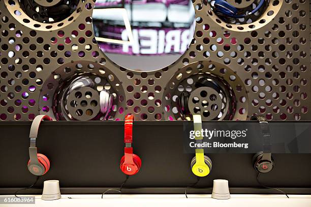 Beats By Dre headphones sit on display at a T-Mobile US Inc. Store in Chicago, Illinois, U.S., on Friday, Oct. 21, 2016. T-Mobile US Inc. Is...