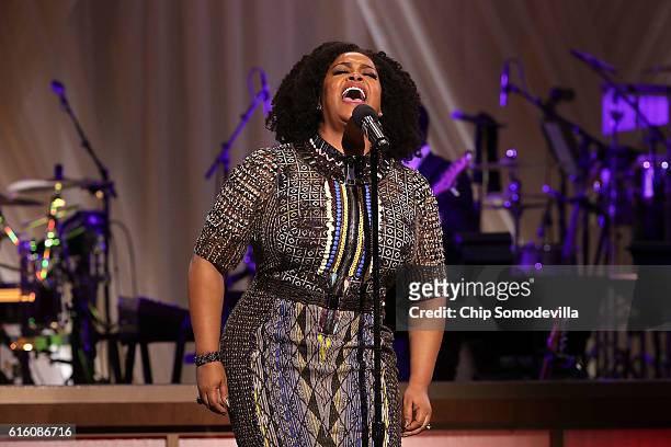 Music artist Jill Scott performs during the BET's 'Love and Happiness: A Musical Experience" in a tent on the South Lawn of the White House October...