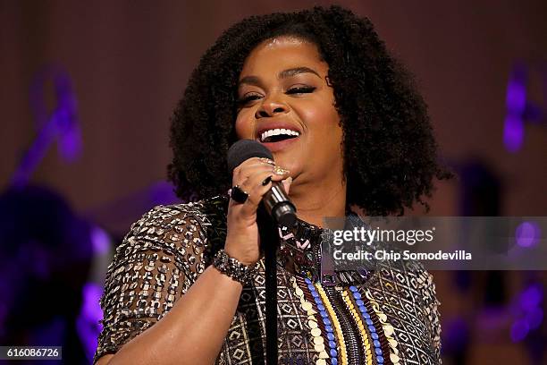 Music artist Jill Scott performs during the BET's 'Love and Happiness: A Musical Experience" in a tent on the South Lawn of the White House October...