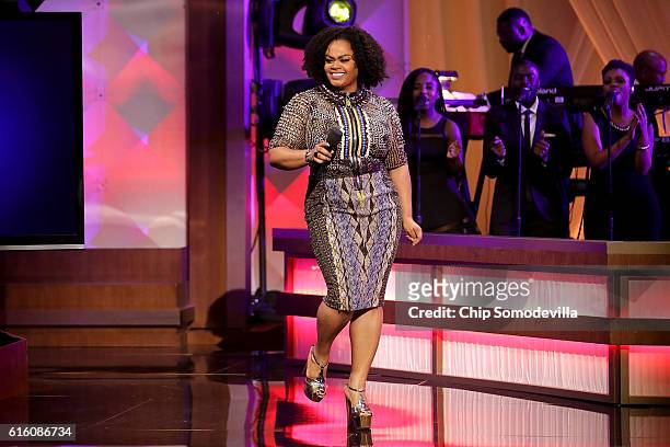 Music artist Jill Scott performs during the BET's 'Love and Happiness: A Musical Experience" in a tent on the South Lawn of the White House October...