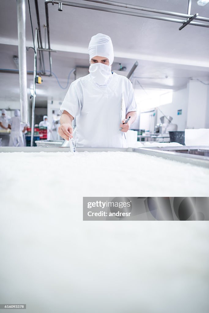 Man working at a dairy factory