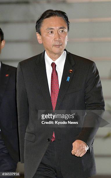 Japan - Keiji Furuya enters the prime minister's office in Tokyo on Dec. 26 after being named minister in charge of the issue of North Korea's...