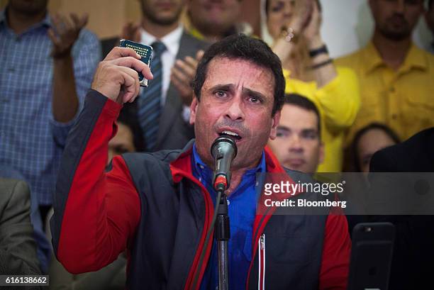 Henrique Capriles, opposition leader and governor of the State of Miranda, speaks during a news conference in Caracas, Venezuela, on Friday, Oct. 21,...