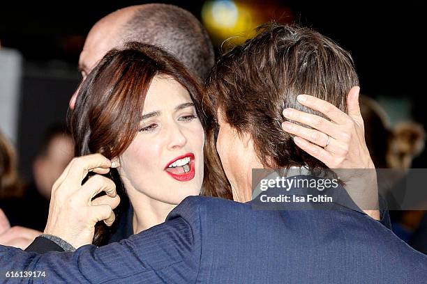 Actor Tom Cruise and canadian actress and model Cobie Smulders attend the 'Jack Reacher: Never Go Back' Berlin Premiere at CineStar Sony Center...