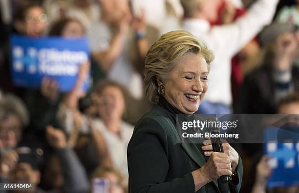 Hillary Clinton, 2016 Democratic presidential nominee, reacts during a campaign event in Cleveland, Ohio, U.S., on Friday, Oct. 21, 2016. Just 24...