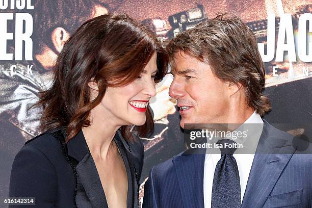 Canadian actress and model Cobie Smulders and US actor Tom Cruise attend the 'Jack Reacher: Never Go Back' Berlin Premiere at CineStar Sony Center...