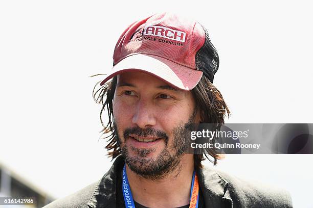 Actor Keanu Reeves walks through the back of the pits during qualifying for the 2016 MotoGP of Australia at Phillip Island Grand Prix Circuit on...