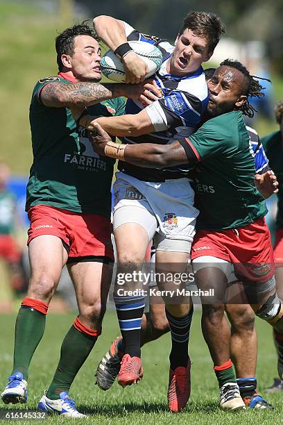 Dane Whale of Wanganui tries to get past Zac Guildford and Inia Katia of Wairarapa Bush during the Heartland Meads Cup match between Wanganui and...