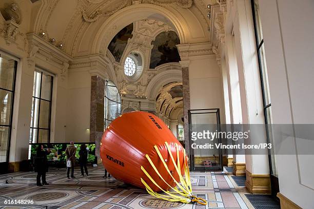 Visitors look at work of art during the opening of the 43rd edition of Fiac, the International Contemporary Art Fair at the the Grand Palais on...