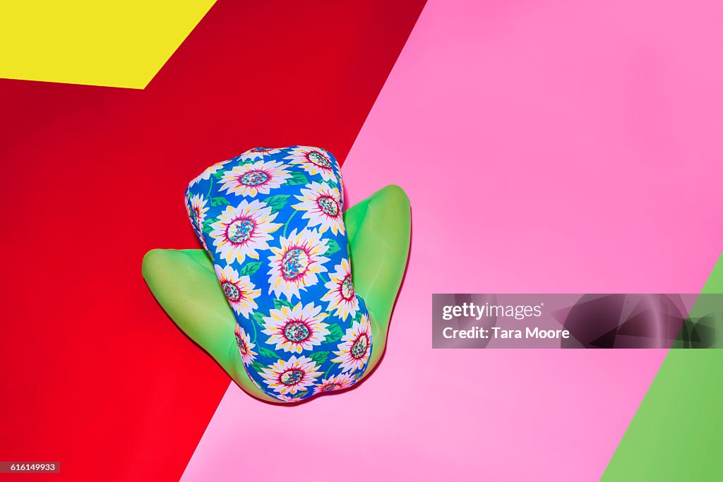 Woman doing yoga with bright colours