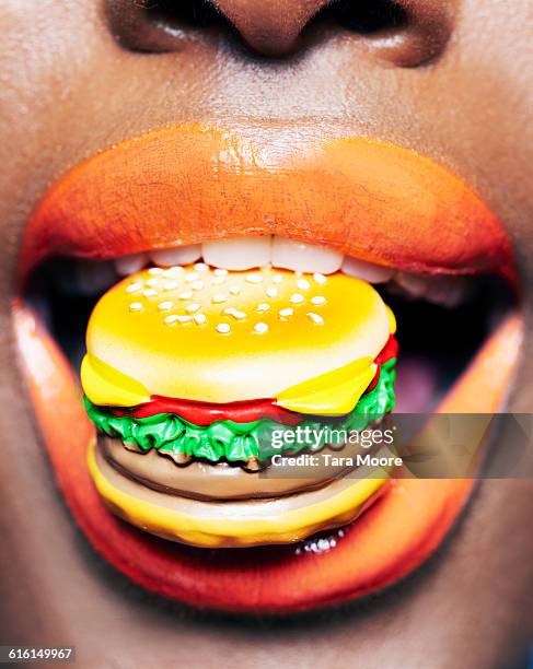 woman with hamburger - mouth open eating stock pictures, royalty-free photos & images