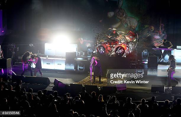 Brian 'Head' Welch, Reginald 'Fieldy' Arvizu, Jonathan Davis, Ray Luzier, and James 'Munky' Shaffer of Korn perform onstage at a private concert for...