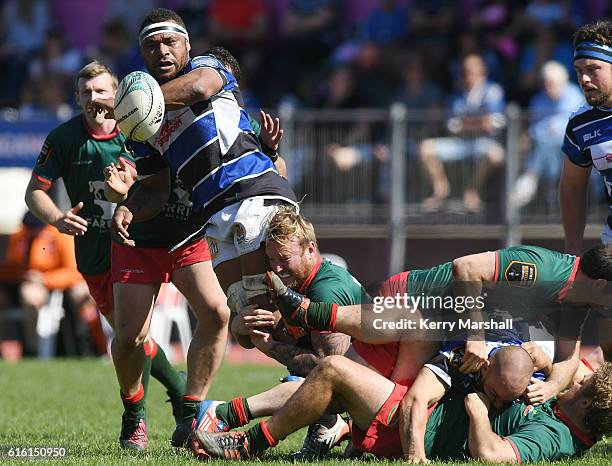 Malakai Volau of Wanganui gets a pass away in a tackle during the Heartland Meads Cup match between Wanganui and Wairarapa Bush on October 22, 2016...