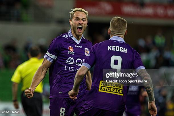 Rostyn Griffiths of Perth Glory helps celebrate Andy Keogh of Perth Glory goal with him during the 3rd Round of the 2016-17 A-League Season between...