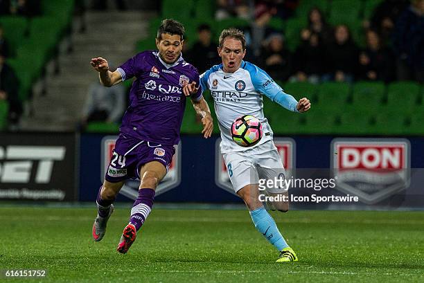 Paulo Retre of Melbourne City and Milan Smiljanic of Perth Glory contest the ball during the 3rd Round of the 2016-17 A-League Season between...