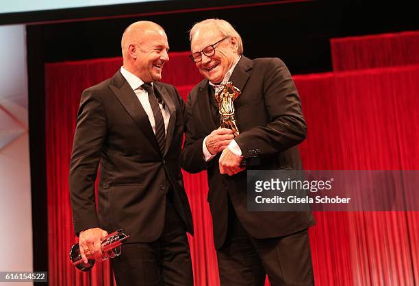 Heino Ferch and Klaus Maria Brandauer with award during the Hessian Film and Cinema Award at Alte Oper on October 21, 2016 in Frankfurt am Main,...