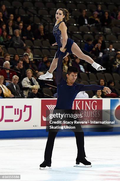 Marissa Catelli and Mervin Tran of the United States perform during the Pairs Short Program on Day 1 of the Grand Prix of Figure Skating at the Sears...