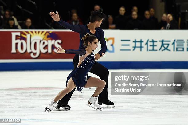 Marissa Catelli and Mervin Tran of the United States perform during the Pairs Short Program on Day 1 of the Grand Prix of Figure Skating at the Sears...