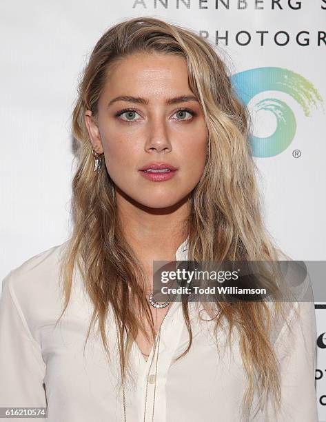 Amber Heard attends the opening of #girlgaze: a frame of mind at Annenberg Space for Photography Skylight Studios on October 21, 2016 in Los Angeles,...