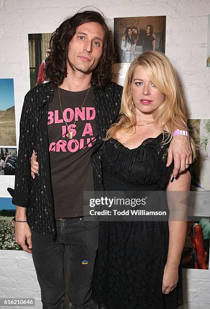 Nick Valensi and Amanda de Cadenet attend the opening of #girlgaze: a frame of mind at Annenberg Space for Photography Skylight Studios on October...