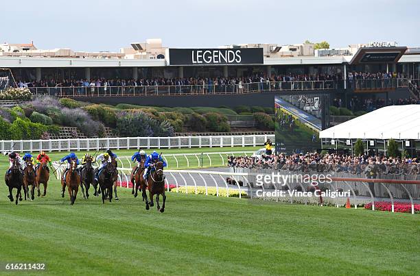Hugh Bowman riding Winx winning Race 9, William Hill Cox Plate during Cox Plate Day at Moonee Valley Racecourse on October 22, 2016 in Melbourne,...