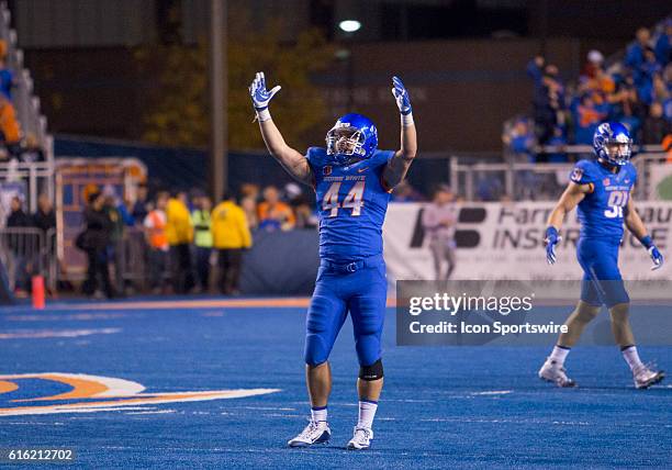 Middle line backer Darren Lee of Boise State celebrates a blocked field goal in the final seconds of the Boise State Broncos versus BYU Cougars game...