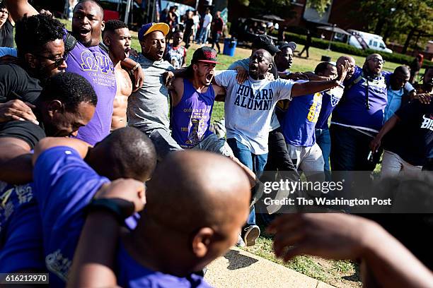 Members of Omega Psi Phi young and Old dance around their beloved sundial as Howard University celebrates it's homecoming with the return of...