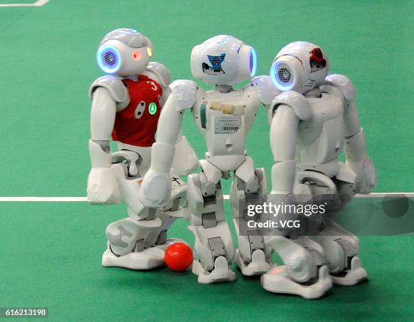 Robots Play Football During 2016 World Robot Conference In Beijing Robots Play Football During 2016 World Robot Conference In Beijing