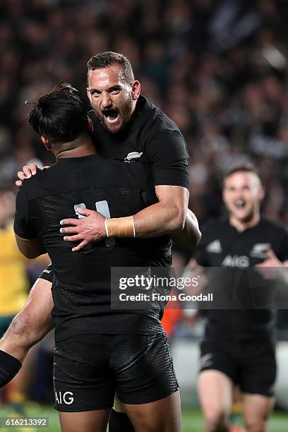 Aaron Cruden of the All Blacks celebrates with Julian Savea after he scores a try during the Bledisloe Cup Rugby Championship match between the New...