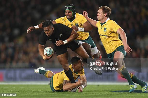 Julian Savea of the All Blacks is tackled during the Bledisloe Cup Rugby Championship match between the New Zealand All Blacks and the Australia...