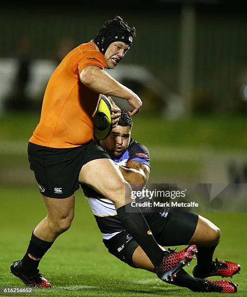 Paddy Ryan of the Eagles is tackled during the 2016 NRC Grand Final match between the NSW Country Eagles and Perth Spirit at Scully Park on October...