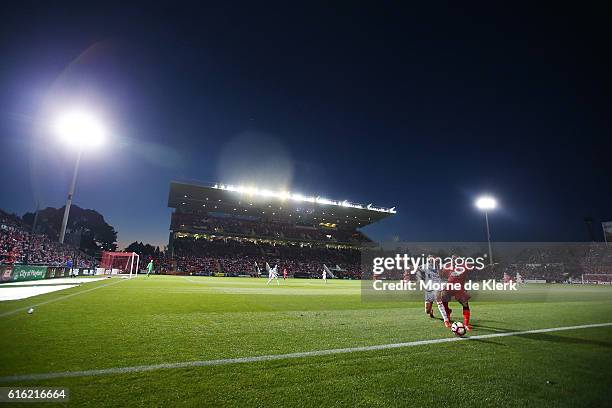 Henrique of Adelaide United wins the ball during the round three A-League match between Adelaide United and Melbourne Victory at Coopers Stadium on...
