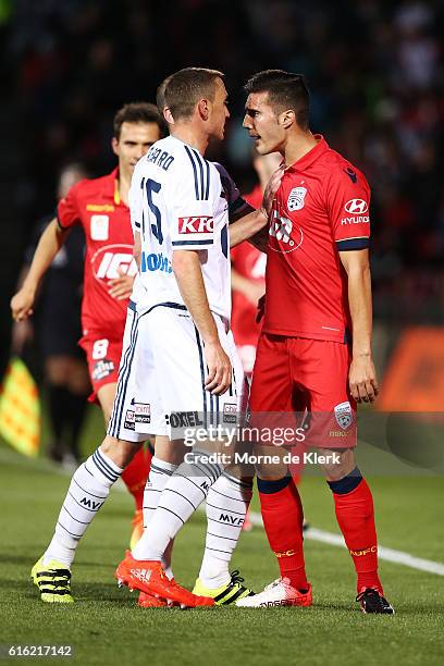 Alan Baro of the Victory and Sergio Guardiola of Adelaide United has words during the round three A-League match between Adelaide United and...