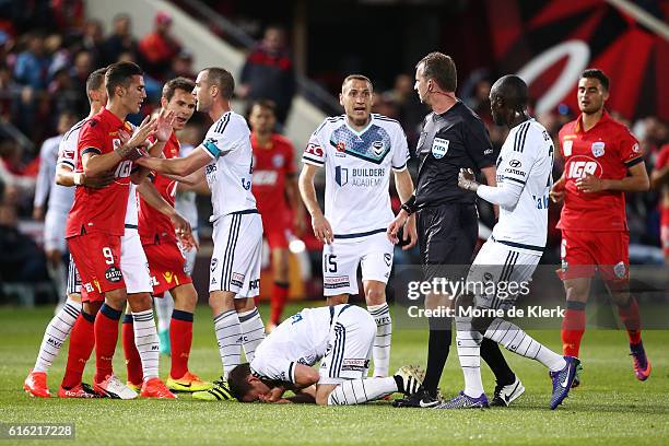 Sergio Guardiola of Adelaide United received a yellow card after a tackle during the round three A-League match between Adelaide United and Melbourne...